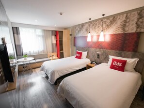 Habitació amb dos llits individuals | Caixa forta a l'habitació i cortines opaques 