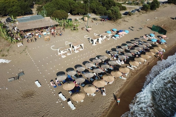 Beach umbrellas, beach massages