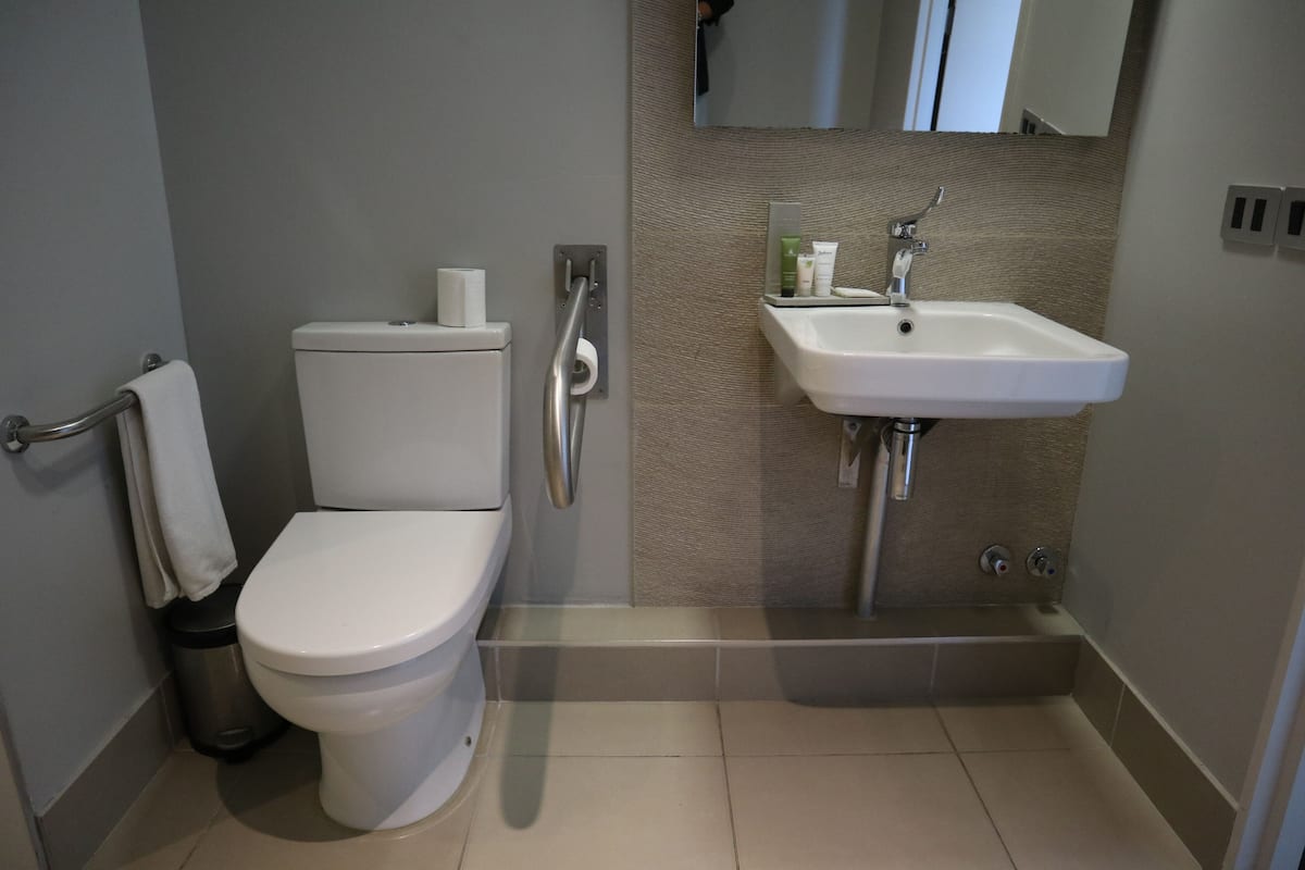 studio, 1 king bed, accessible, non smoking | bathroom | shower, free toiletries, hair dryer, towels