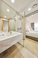 Shower, hair dryer, bathrobes, slippers