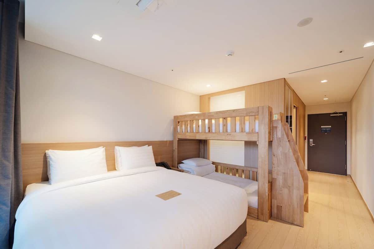 Deluxe Family Twin Room Jacuzzi with Low floor (Jacuzzi Unusable) | In-room safe, laptop workspace, blackout curtains, soundproofing