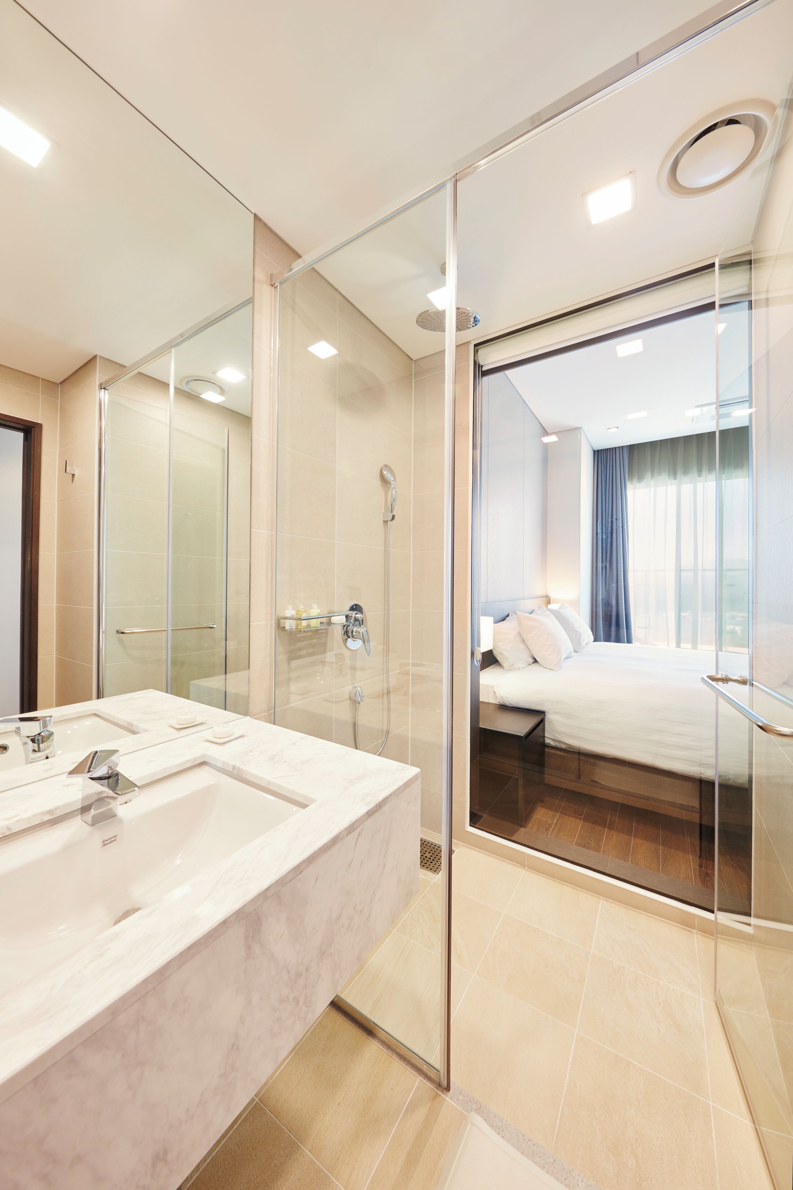 shower, hair dryer, bathrobes, slippers