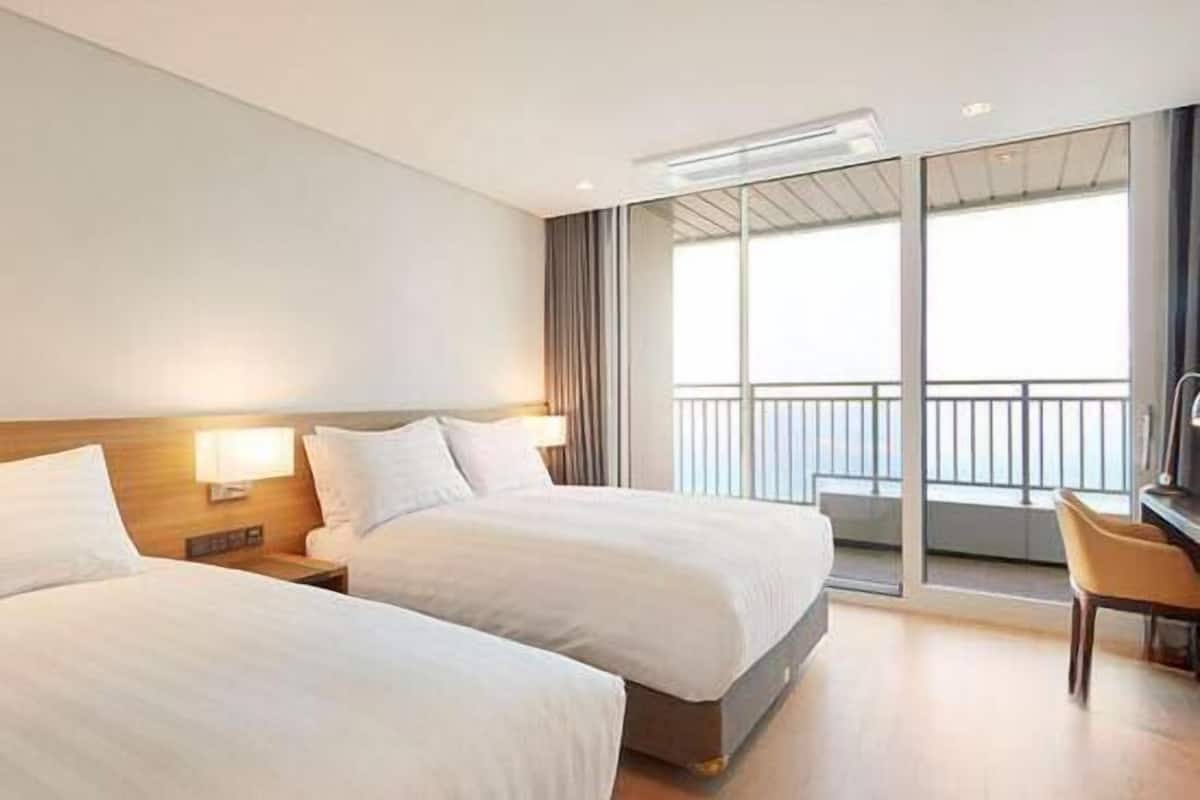 In-room safe, laptop workspace, blackout drapes, soundproofing