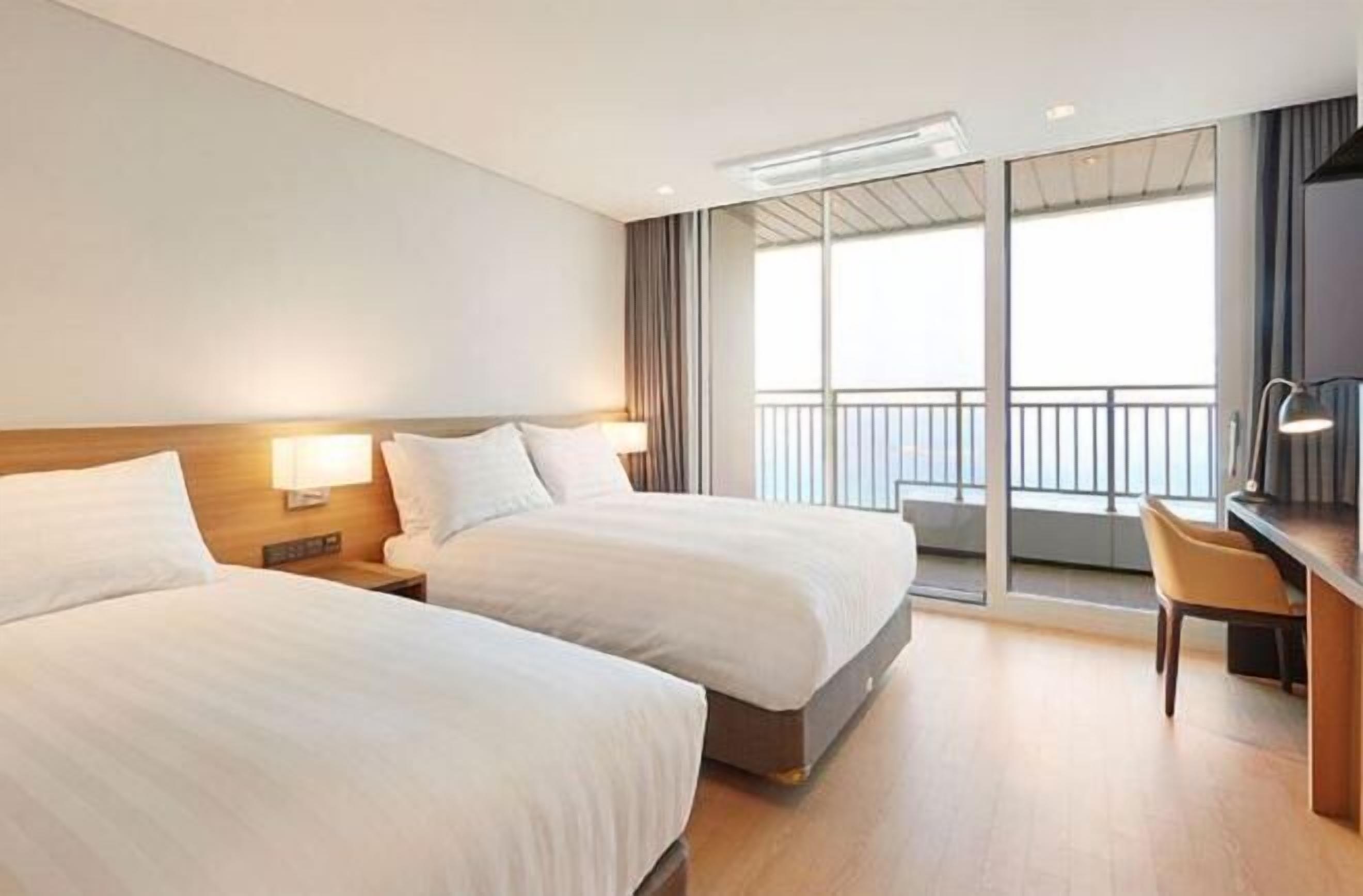 In-room safe, laptop workspace, blackout drapes, soundproofing