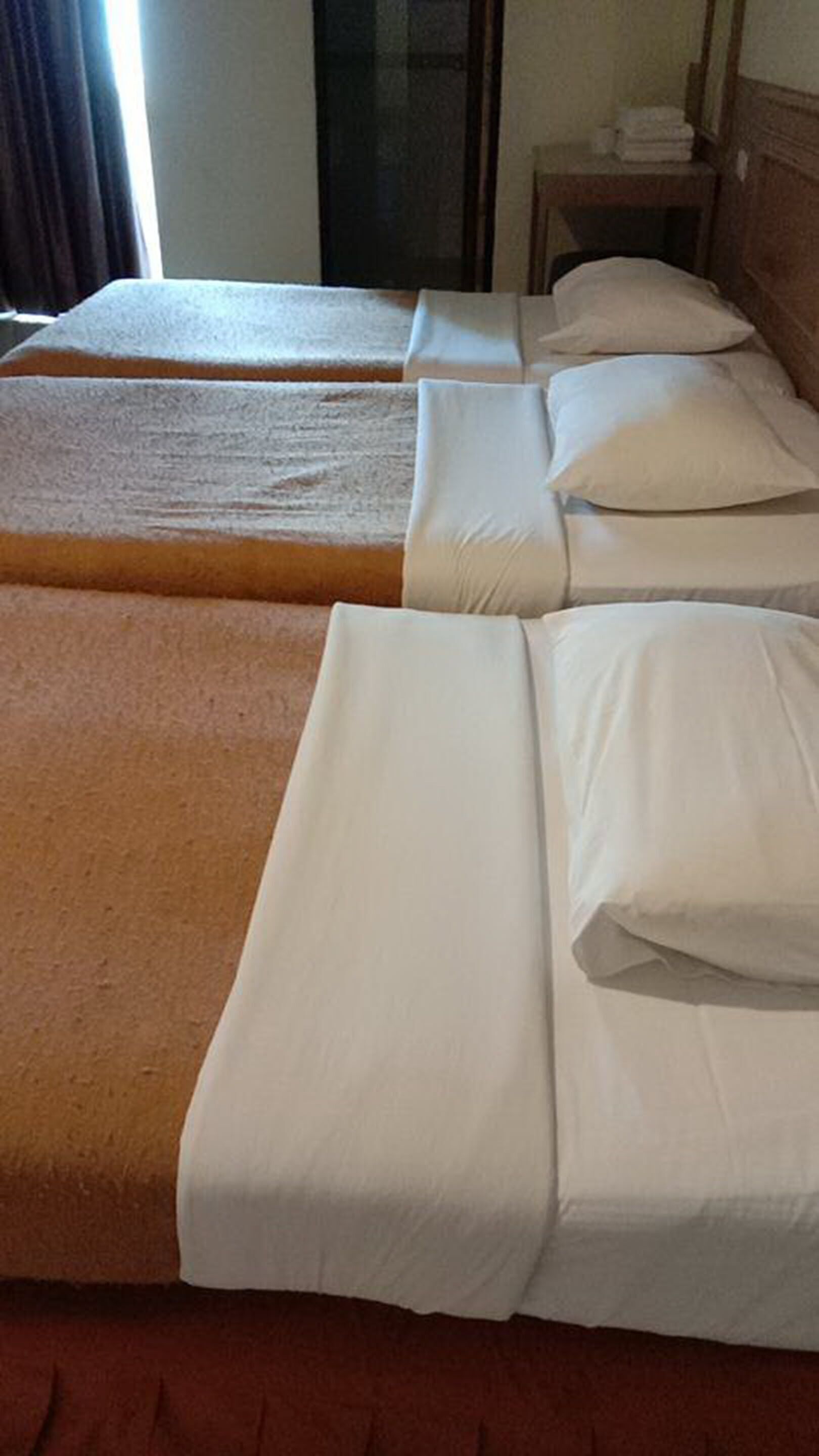 Desk, rollaway beds, free WiFi, bed sheets