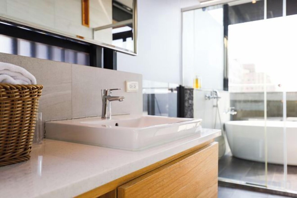 Bathroom | Hair dryer, slippers, bidet, towels