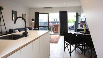 Apartment | Private kitchen | Full-size fridge, oven, stovetop, dishwasher