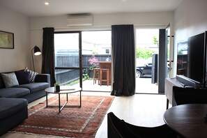 Apartment | Living area | Flat-screen TV - Enchanting Downtown Abode (Christchurch)