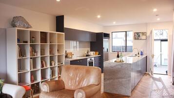 Chic Designer Abode (w/ Single Sofa Bed) | Private kitchen | Full-sized fridge, oven, stovetop, dishwasher