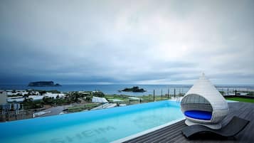 Seasonal outdoor pool, open 10:00 AM to 8:00 PM, sun loungers