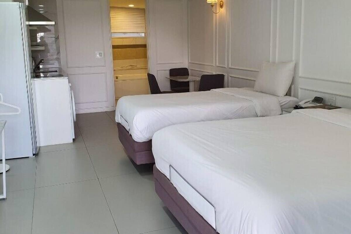 Family Twin Room, Multiple Beds, Non Smoking, Garden View | Desk, blackout drapes, soundproofing, WiFi (free)