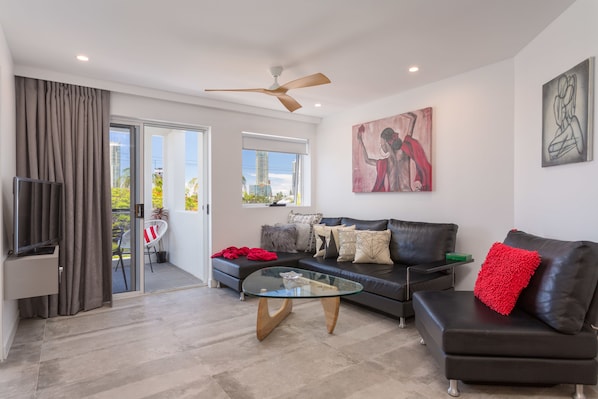 Design Apartment, 1 Bedroom, City View | Living area | Flat-screen TV, pay films