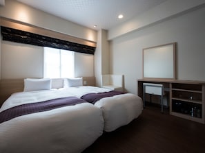 Cubrecamas, cortinas blackout, wifi gratis y ropa de cama