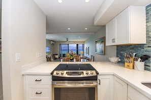 Condo, 3 Bedrooms | Private kitchen | Fridge, microwave, oven, coffee/tea maker
