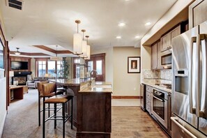 Condo, 3 Bedrooms | Private kitchen | Full-sized fridge, microwave, oven, stovetop