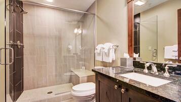 Condo, 1 Bedroom | Bathroom | Bathtub, hair dryer, towels, shampoo