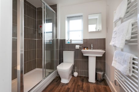 Apartment, 2 Bedrooms | Bathroom | Shower, free toiletries, hair dryer, towels. The Coach House