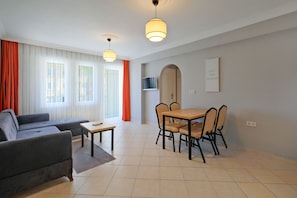 Comfort Apartment, 2 Bedrooms, Balcony | Living area | 106-cm plasma TV with satellite channels - Gold Lion Apart Hotel (Fethiye)