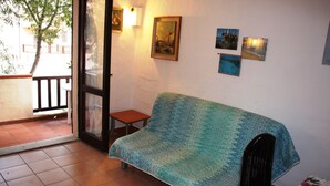Apartment, 1 Bedroom | Living area - Residence Itaca (Santa Teresa di Gallura)