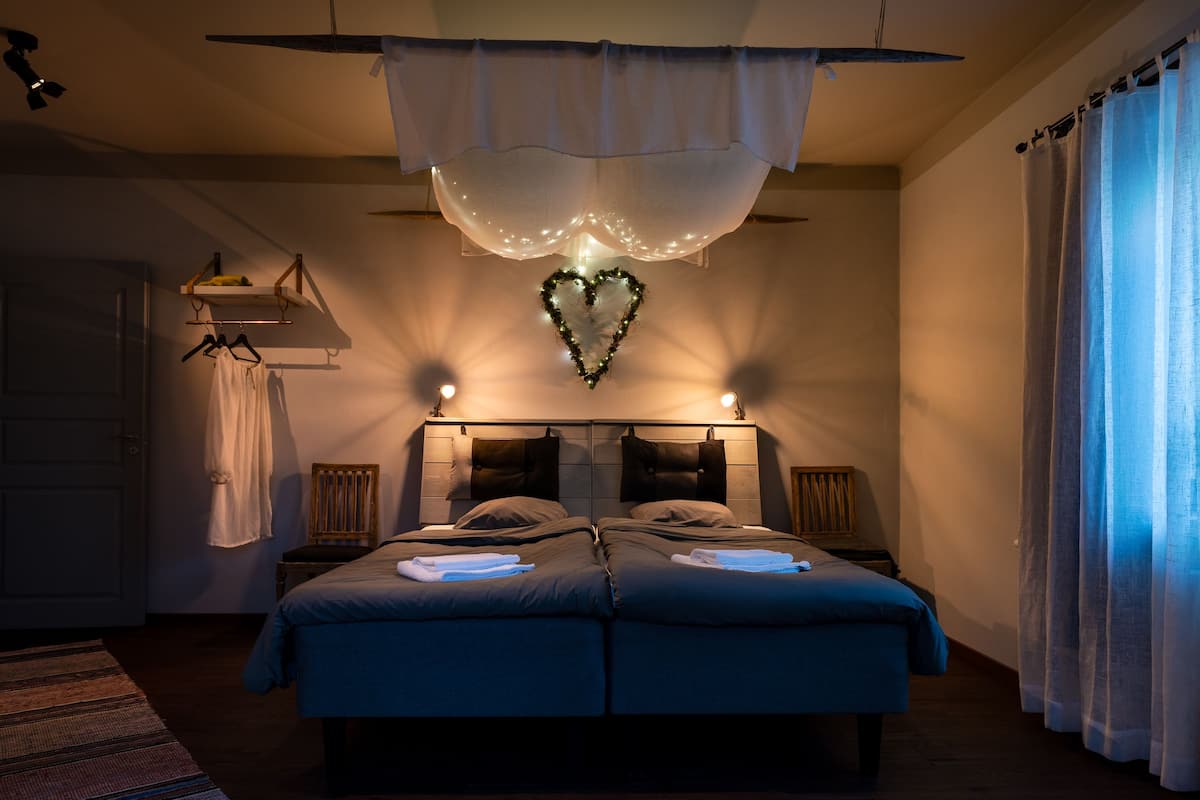 Suite, Bathtub, Lagoon View | 1 bedroom, blackout curtains, soundproofing, iron/ironing board