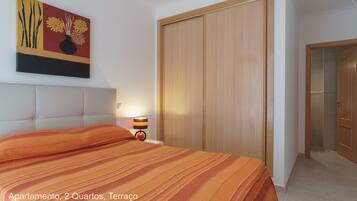 Apartamento, 2 quartos, terraço | Roupa de cama