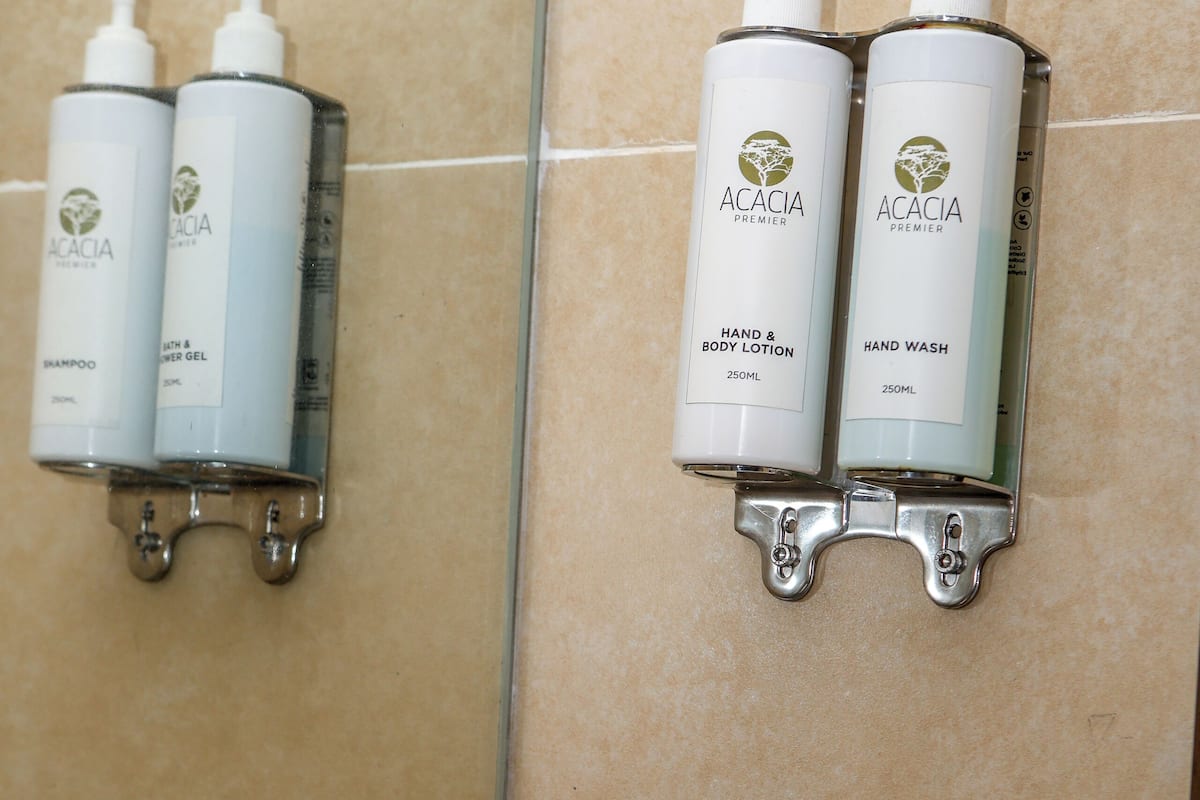 deluxe room | bathroom | shower, free toiletries, hair dryer, bathrobes