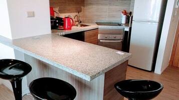 Standard Apartment, 2 Bedrooms | Private kitchen | Full-size fridge, microwave, oven, stovetop