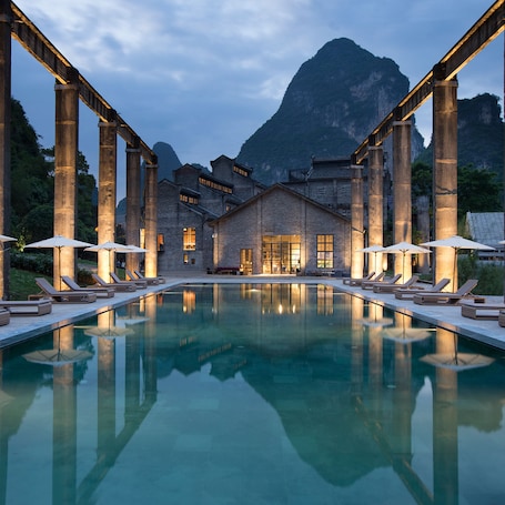 Outdoor pool, open 6:00 AM to 8:00 PM, pool umbrellas, sun loungers
