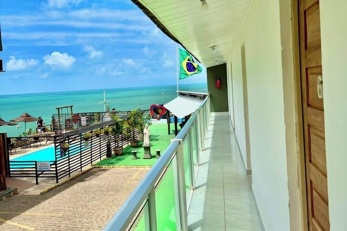 Economy Triple Room | Minibar, blackout curtains, iron/ironing board, free WiFi