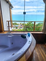 Habitación Deluxe, vistas al mar, planta baja | Minibar, cortinas opacas, tabla de planchar con plancha y wifi gratis
