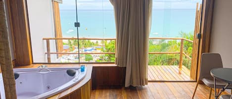 Deluxe Room, Sea View, Ground Floor | Minibar, blackout curtains, iron/ironing board, free WiFi