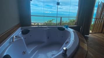 Deluxe Room, Sea View, Ground Floor | Minibar, blackout drapes, iron/ironing board, free WiFi