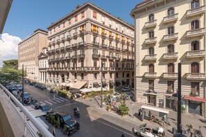 A multi-story building with a classic architectural style, featuring balconies and a central courtyard. - Le Mummarelle 20 (Naples)