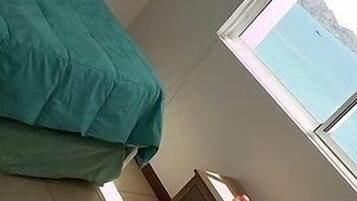 Apartamento standard, 2 quartos | 2 quartos, ferros/tábuas de passar roupa, Wi-Fi de cortesia