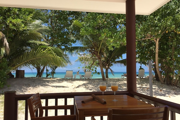 Playa privada, arena blanca, toallas de playa