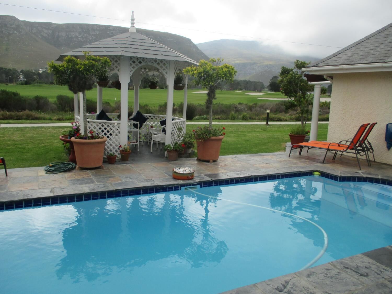 Outdoor pool, sun loungers