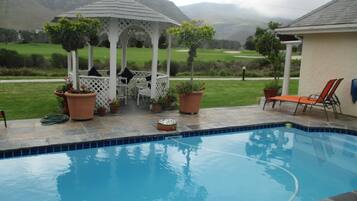 Outdoor pool, sun loungers