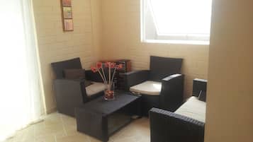 Family Apartment, 3 Bedrooms | Living room | TV