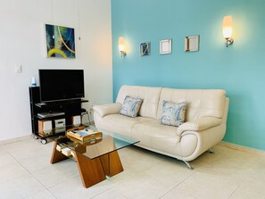 Standard Condo, 2 Bedrooms, Kitchen, Ground Floor | Living area | Flat-screen TV, DVD player - Las Olas downtown Condos by Playa Paradise (Playa del Carmen)