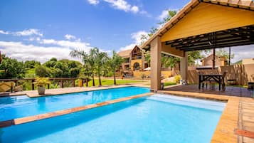 Outdoor pool, pool umbrellas, pool loungers
