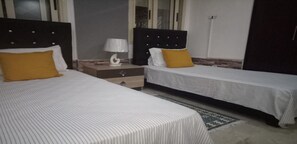 1 bedroom, individually decorated, blackout drapes, iron/ironing board