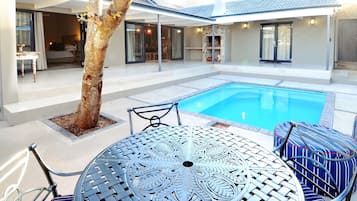 Outdoor pool, pool umbrellas, pool loungers