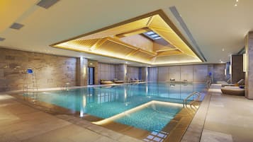 Indoor pool, open 7:30 AM to 10:00 PM, pool loungers