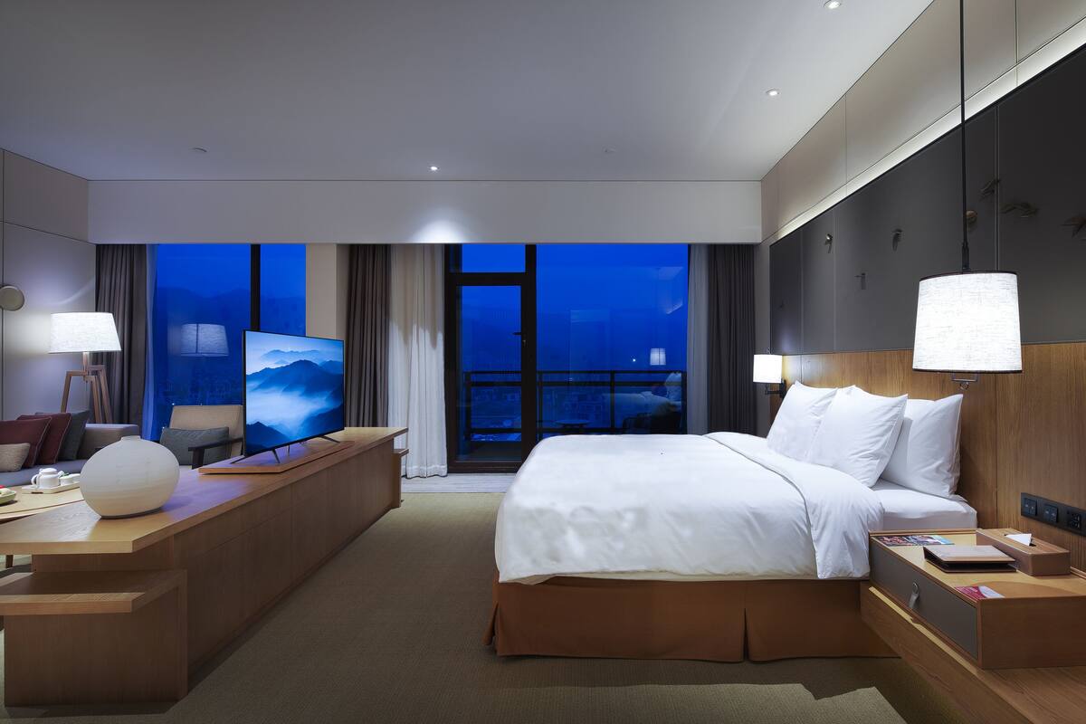 Suite junior | Ropa de cama de alta calidad y minibar 