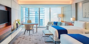 Premium bedding, down comforters, pillowtop beds, minibar