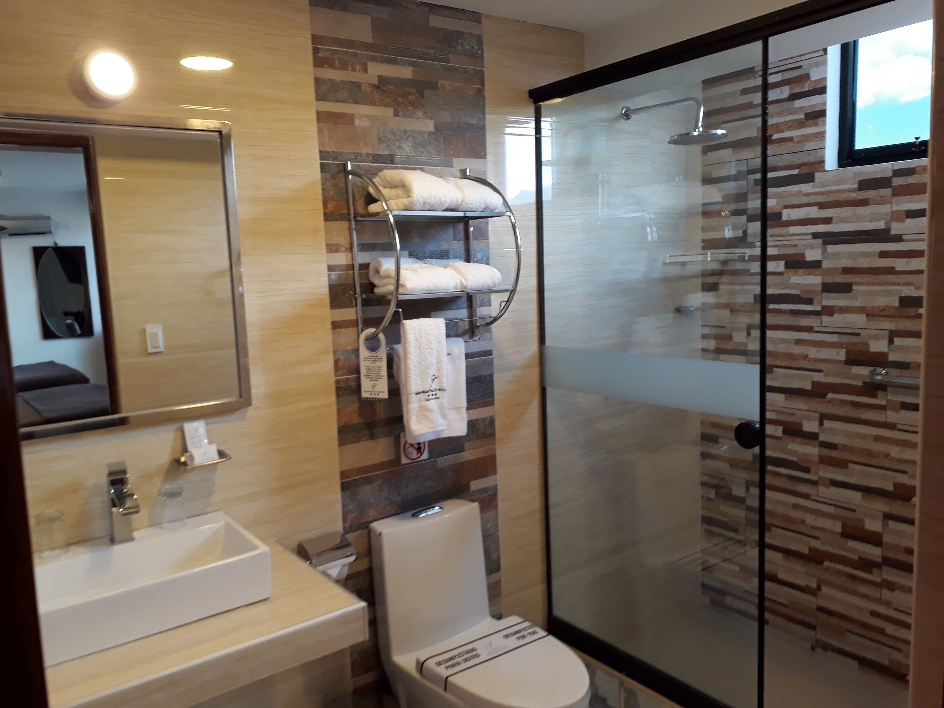 shower, rainfall showerhead, free toiletries, hair dryer