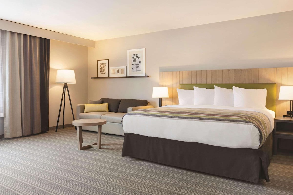 1 bedroom, blackout drapes, soundproofing, iron/ironing board
