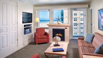 Flat-screen TV, fireplace, pay films