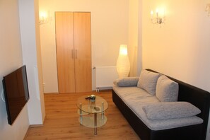 TV - Luxury apartment in the City West in a great location with Teerasse (Berlin)