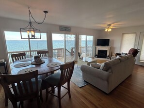 Smart TV, fireplace, table football, books